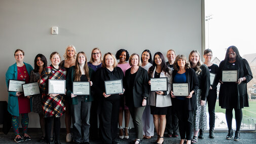 2024 recipients of the Women of Courage, Character, and Commitment award pose together.