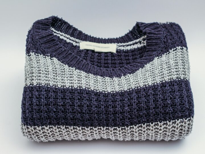 Navy blue and gray striped sweater.